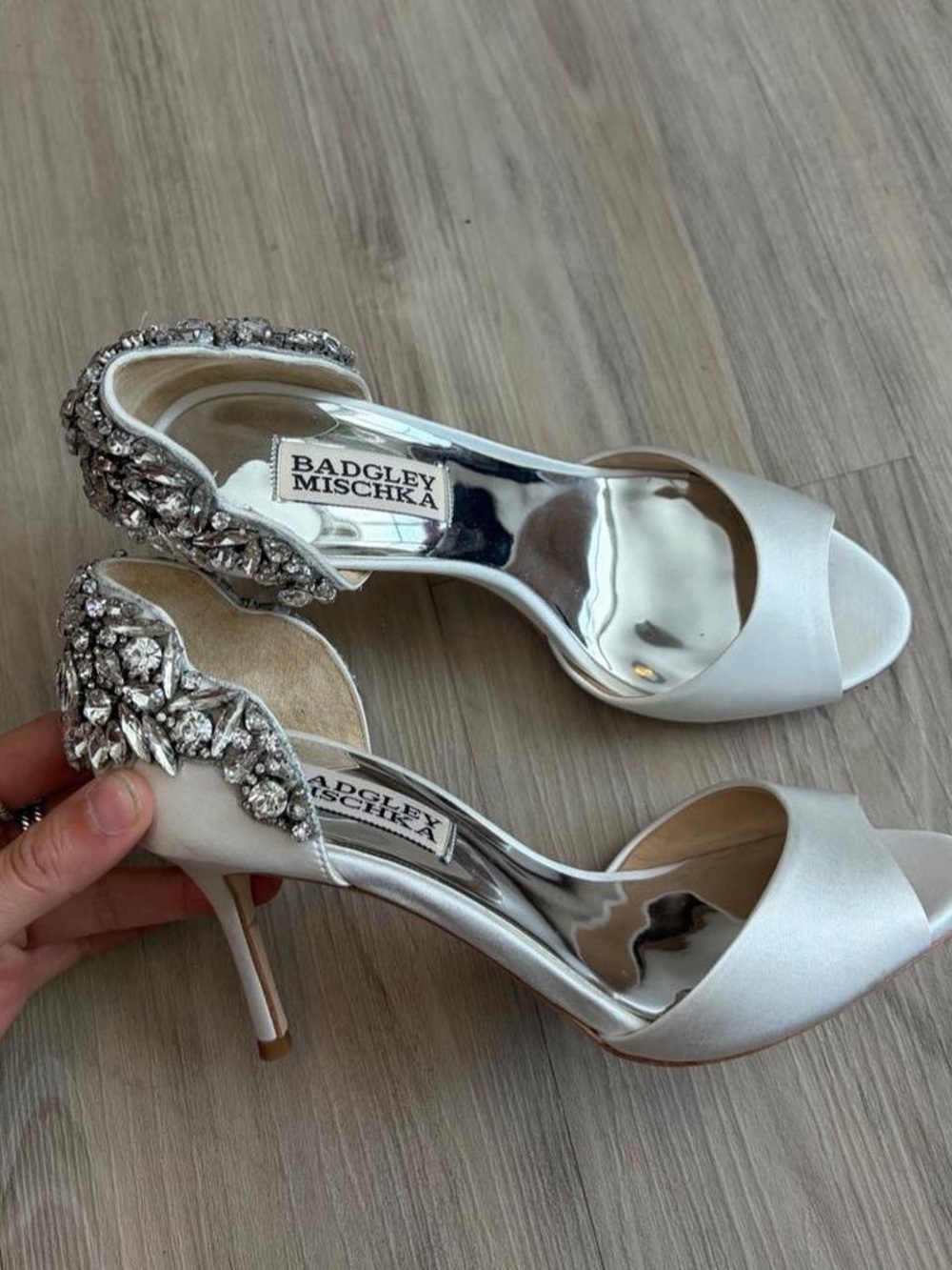 Badgley Mischka white heels with rhinestone embellishments